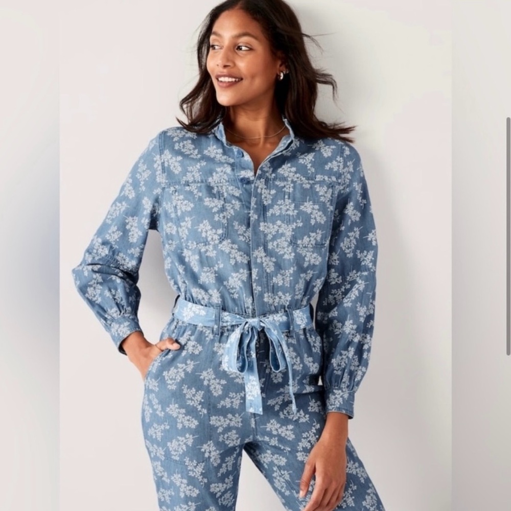 Denim jumpsuit / one piece overall with matching belt. Long sleeve printed. W M